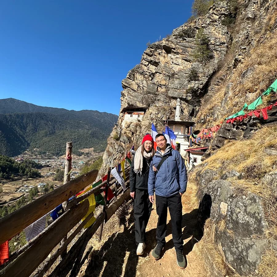 A couple on the hiking trail near Taktsang, the Tiger's Nest monastery