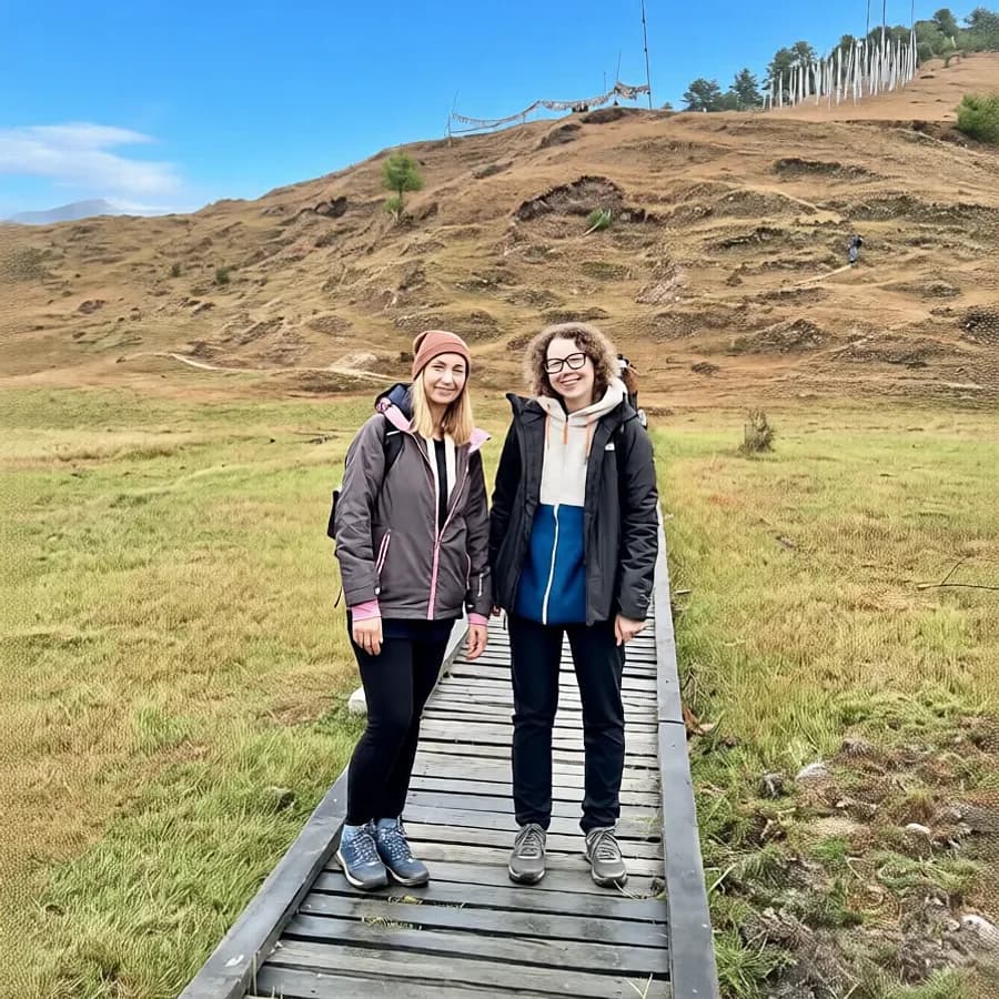 Travelers on the boardwalk through Phobjikha valley