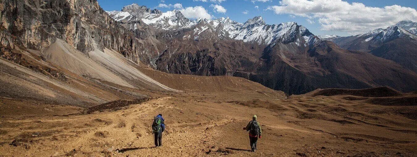 Trekkers approaching Mount Jomolhari